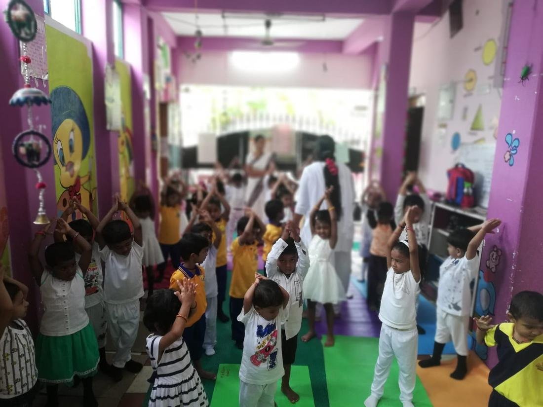 Children doing yoga and movement activities